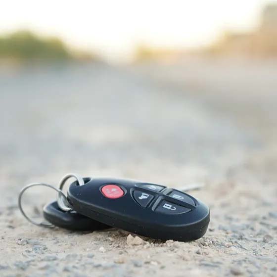 Car key in road