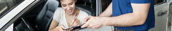 Signing contract from car window