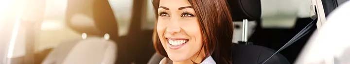 Woman smiling in car