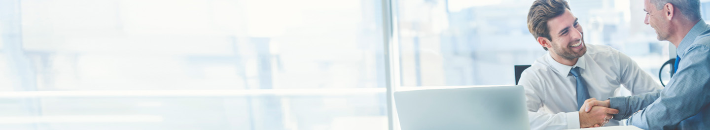 Two men in meeting shaking hands