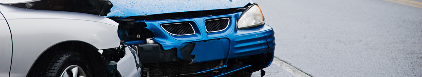 Blue and grey car in accident