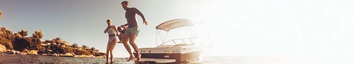 Family jumping off boat