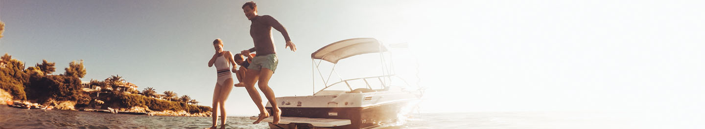 Family jumping off boat
