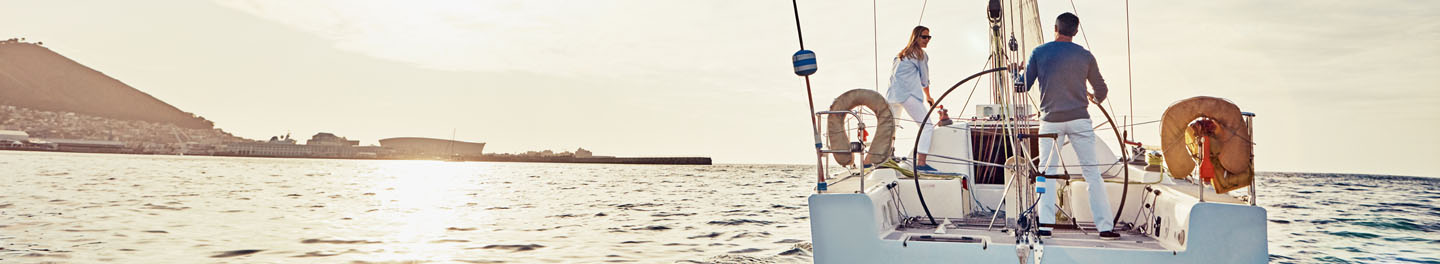 People on boat during sunset