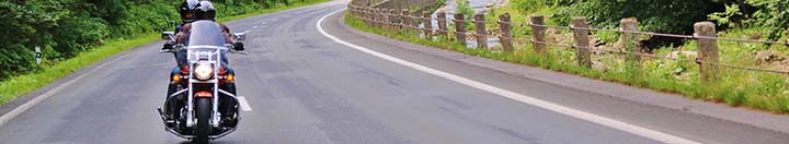 Motorcycle riding on winding road
