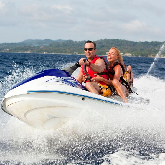 Family on personal watercraft