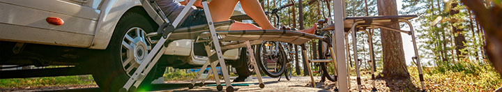 RV with woman camping