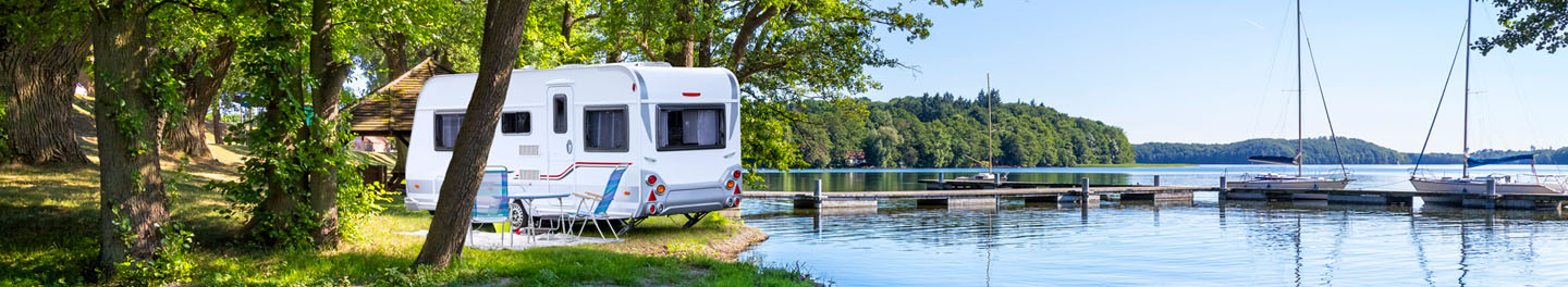 Travel trailer by lake